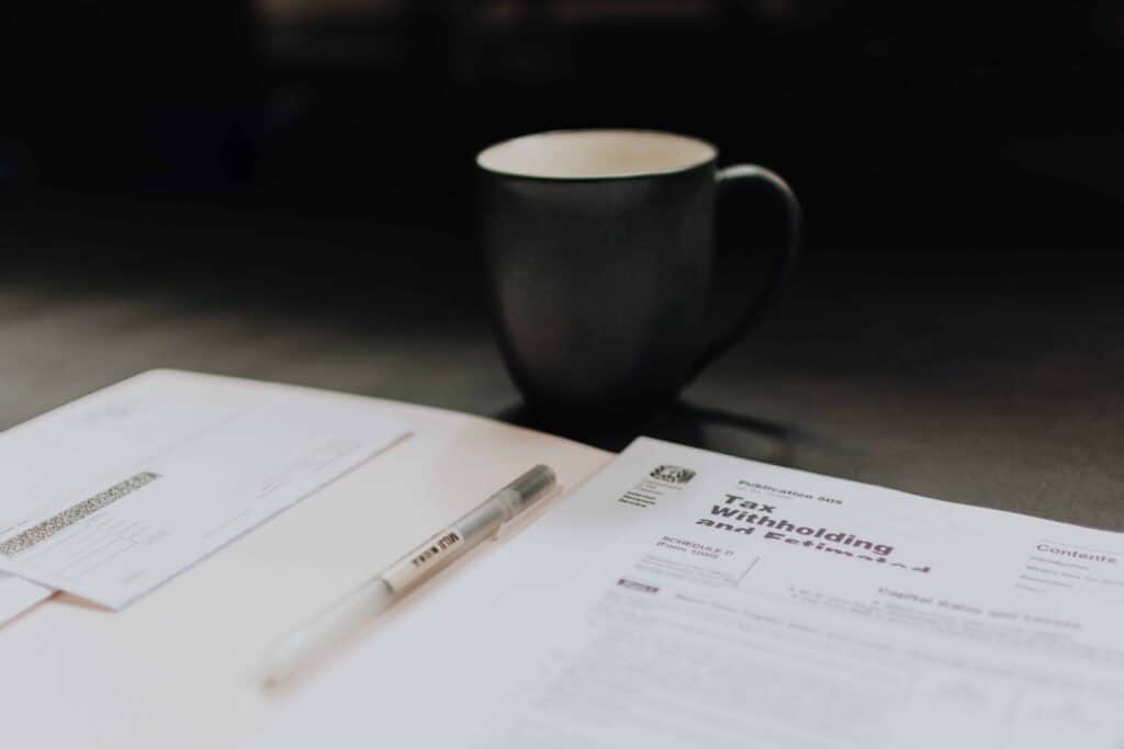 Tax Forms with Cup of Coffee