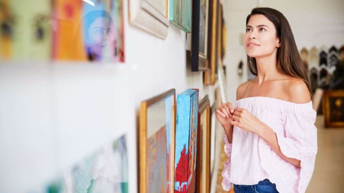 10 Most Creative Cities; Woman looking at artwork