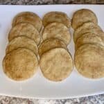 Cinnamon sugar cookies on a white plate, made with the best snickerdoodle recipe.